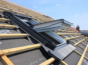 Pose et réparation de velux 92